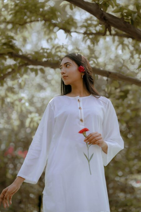 Elegant white cotton kurta with threadwork neckline