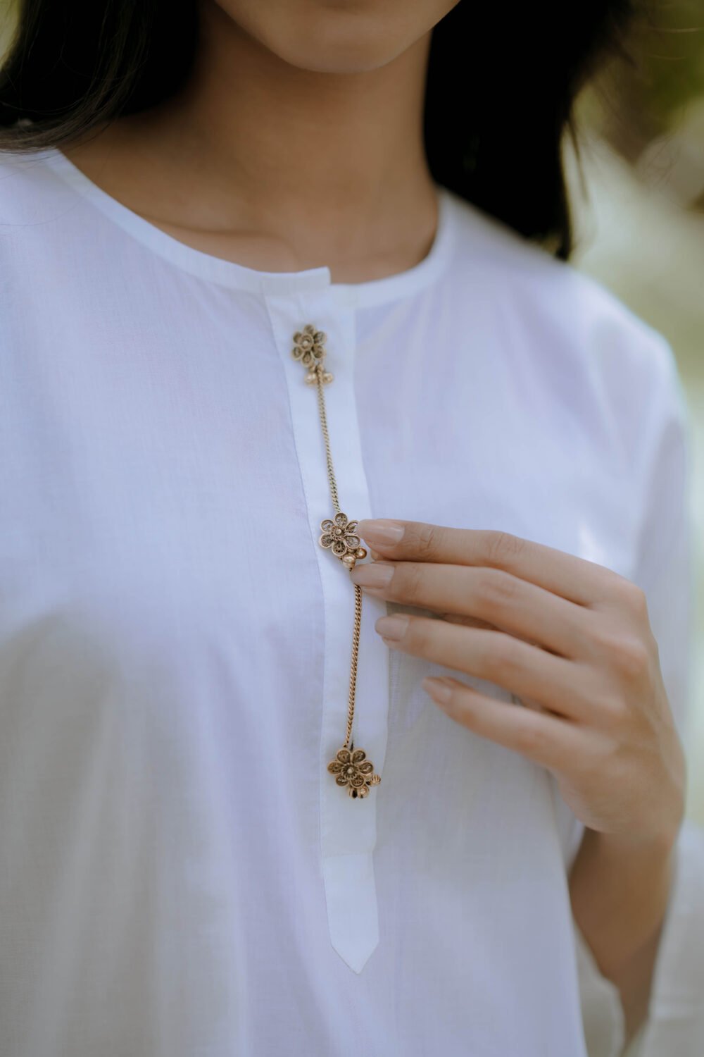 Elegant white cotton kurta with threadwork neckline
