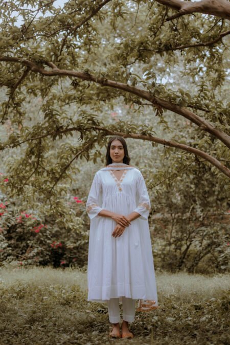 Elegant white cotton kurta with threadwork neckline